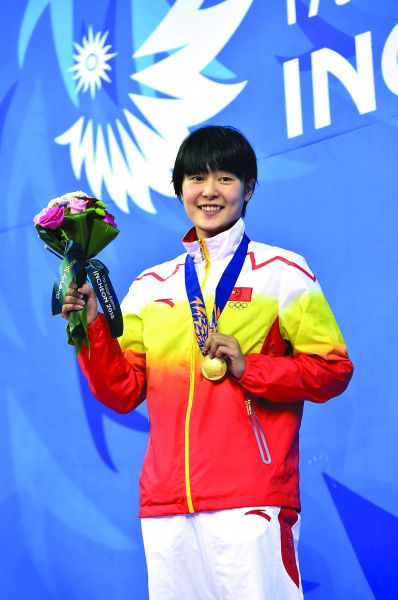 zhang yuhan remporte la médaille dor du 400